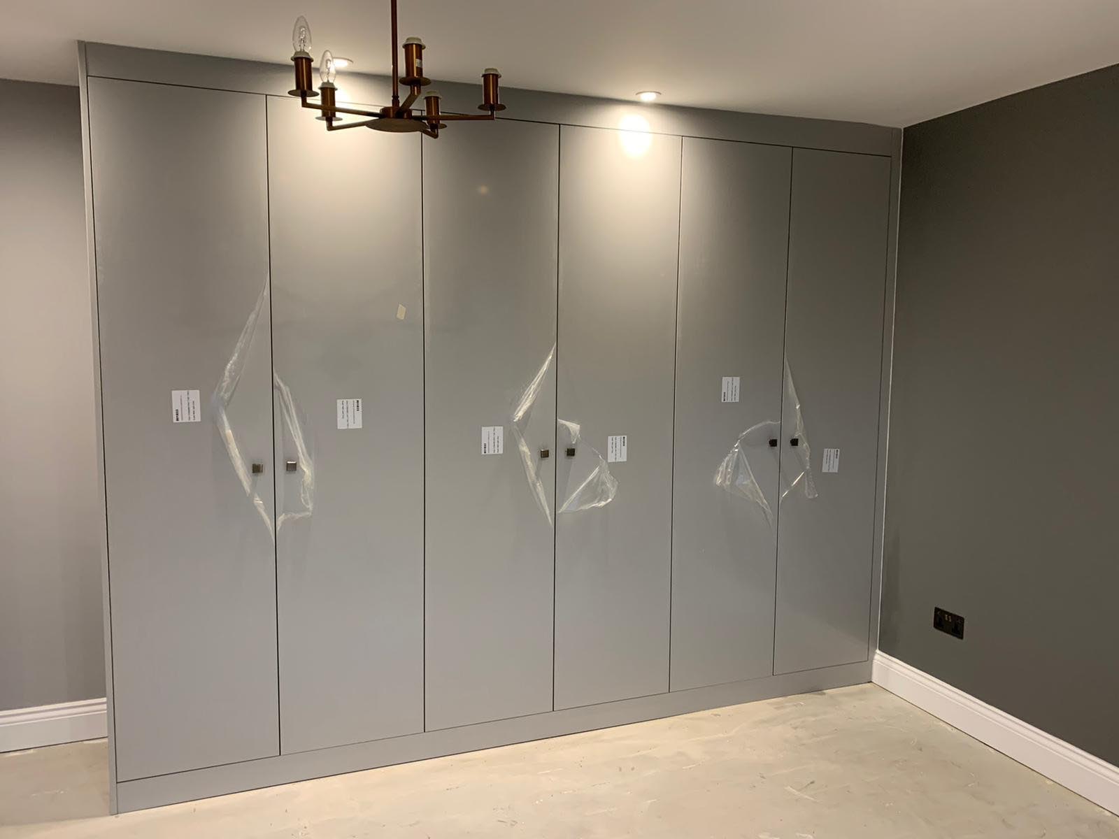 Fitted wardrobe designed, supplied and installed by Hampdens KB