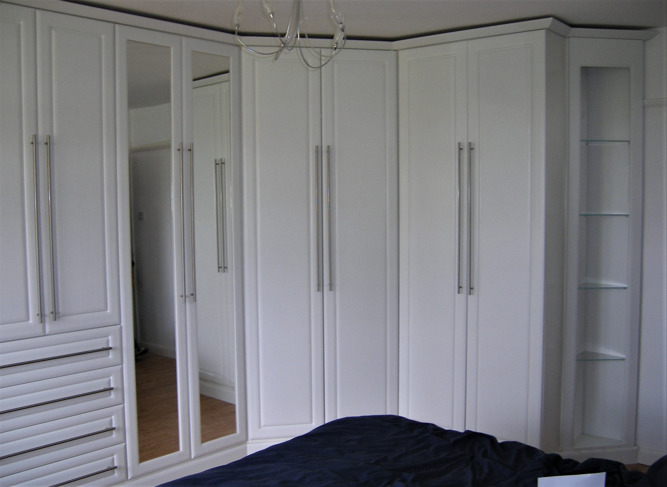 Fitted wardrobe from Hampdnes KB designed, supplied and installed in Palmers Green