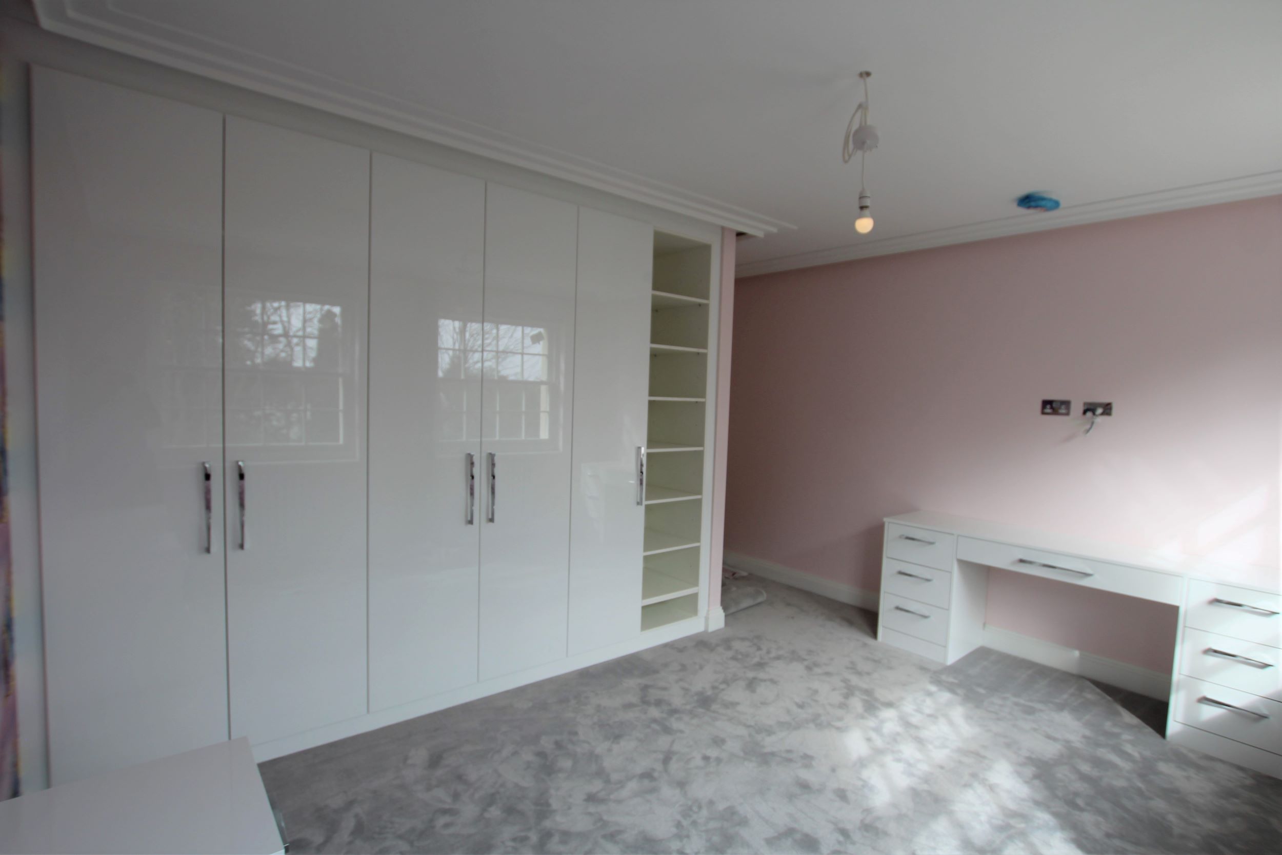 Bespoke bedroom designed, supplied and installed in Whetstone by Hampdens KB