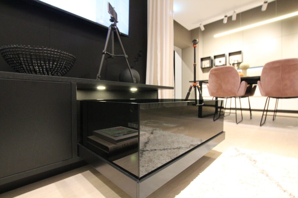 Bespoke media walls with integrated TV space by Hacker